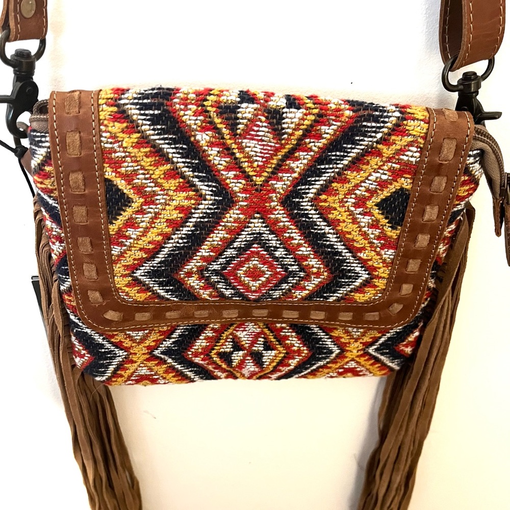 Myra bag hand crafted multicolored cross body bag.